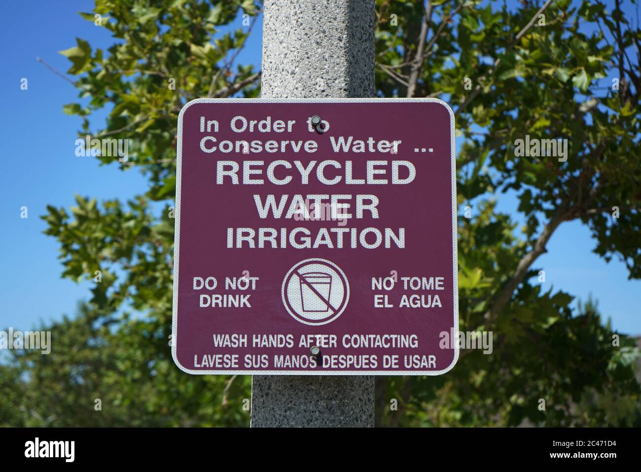 Recycled Water water sign in English and Spanish Stock Photo