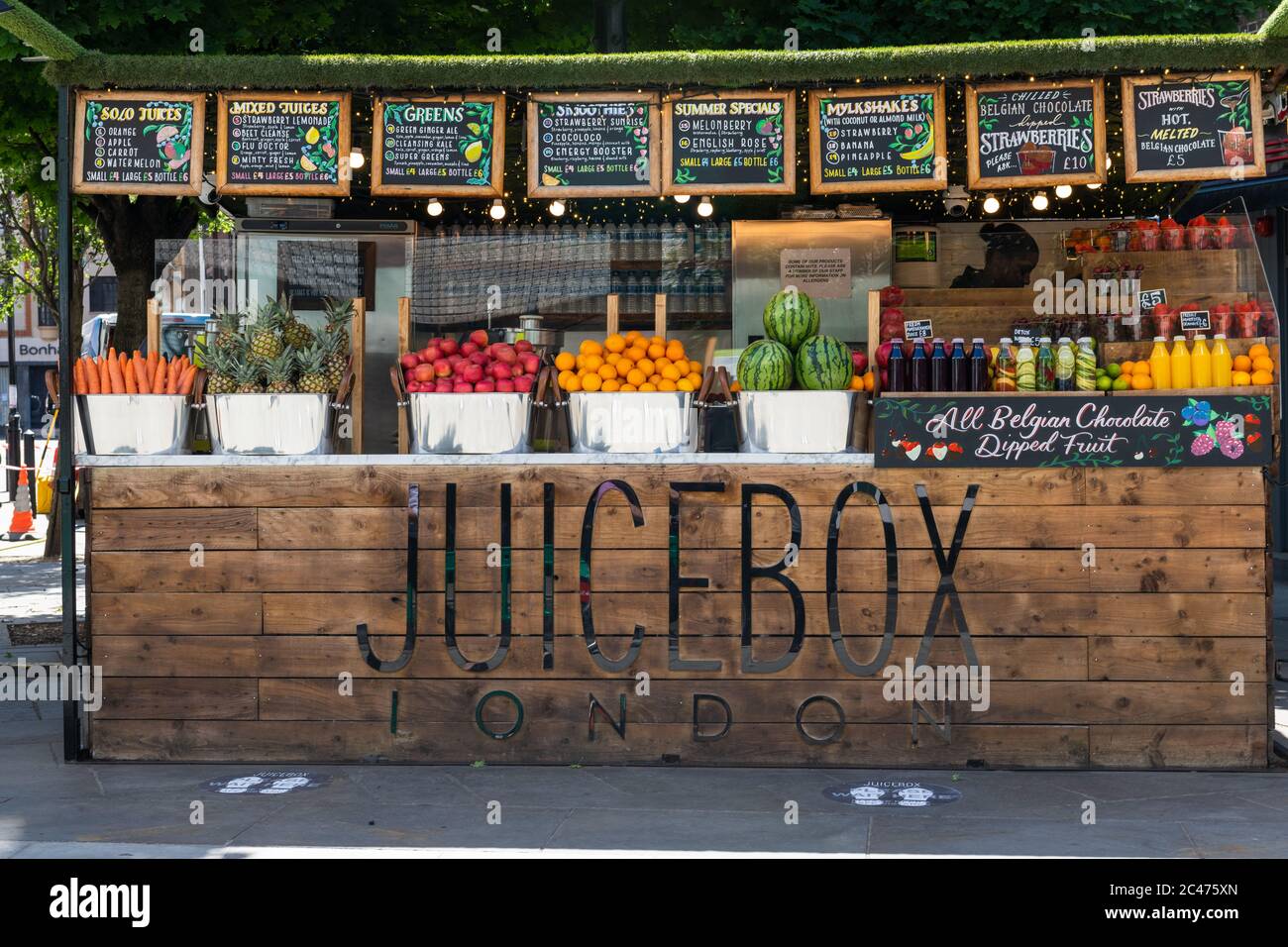 A colourful small business in Oxford Street specialising in fresh juices. Stock Photo