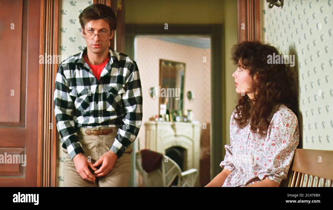USA. Alec Baldwin and Geena Davis in a scene from ©Warner Bros film:  Beetlejuice (1988). Plot: The spirits of a deceased couple are harassed by  an unbearable family that has moved into