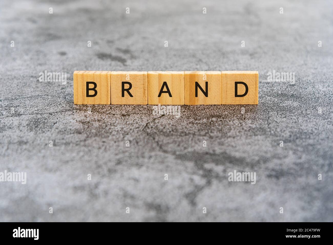 Brand text on wooden block textures background Stock Photo