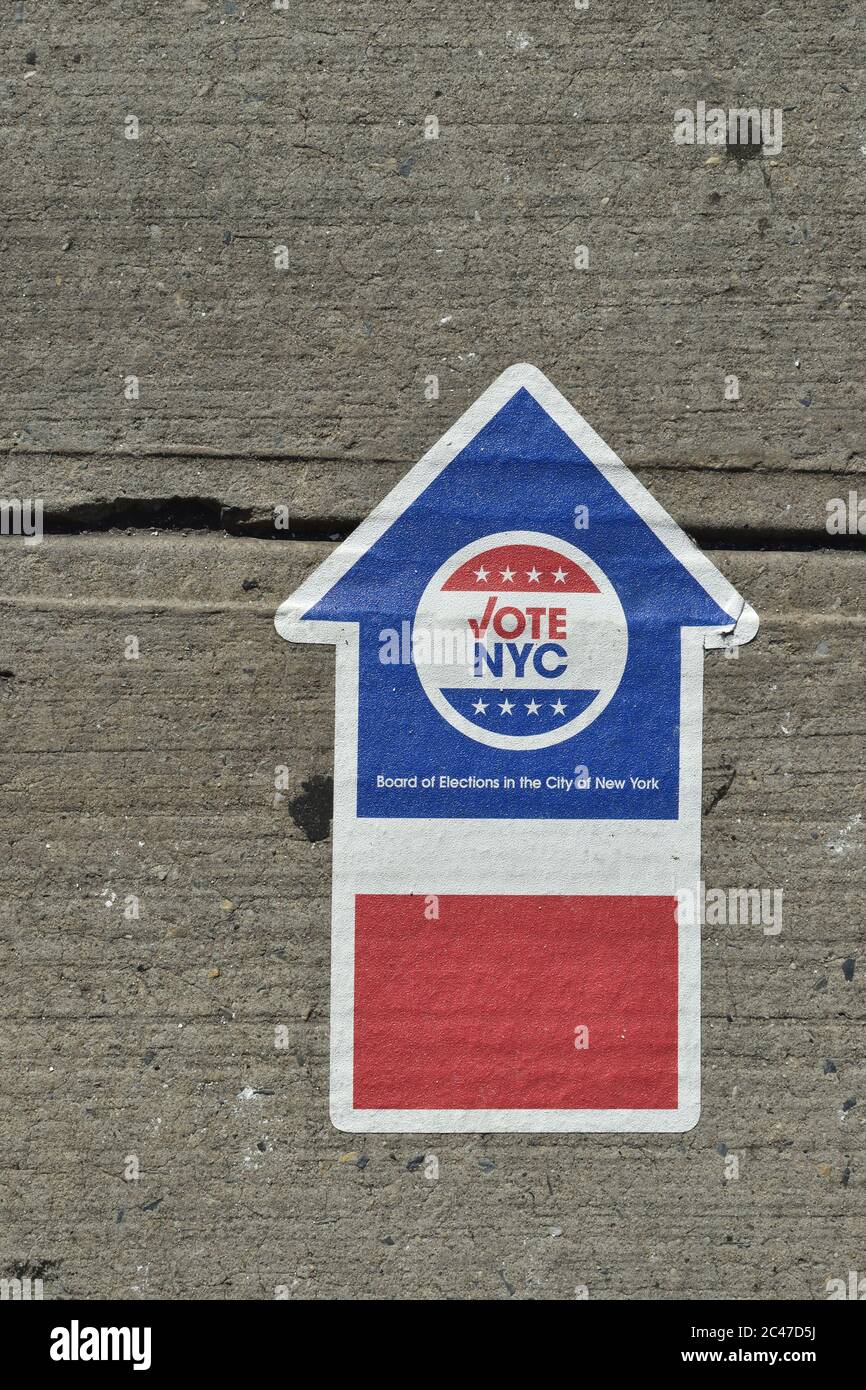 Vote NYC arrow sticker on a city sidewalk pointing up, June 21, 2020, in New York. Stock Photo