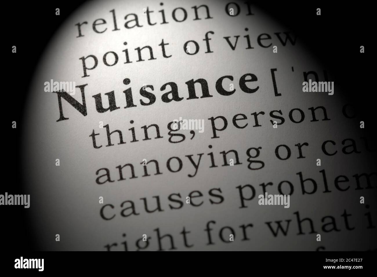 Fake Dictionary, Dictionary definition of word nuisance. Stock Photo