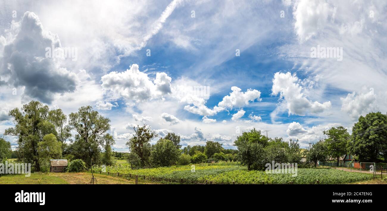 Blue sky with white clouds in a beautiful summer day Stock Photo - Alamy