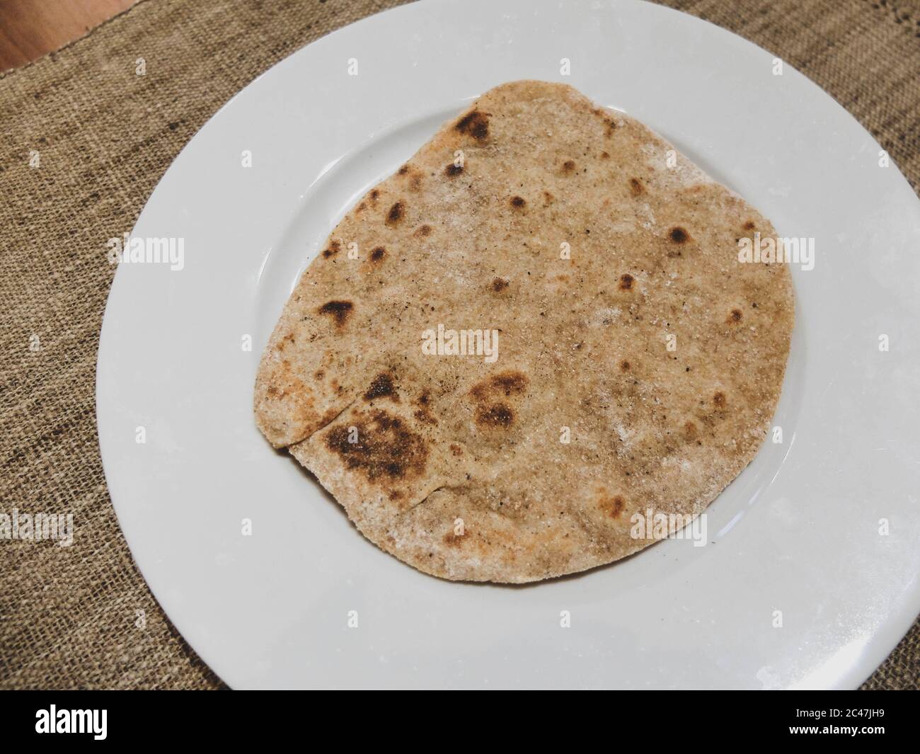 Indian homemade chapati. Chapati is a flat bread from India, made with only water, wheat flour