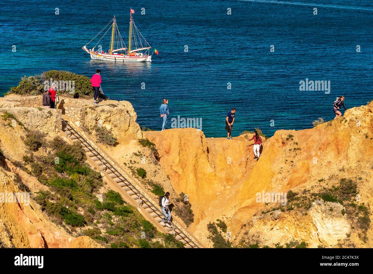 Lagos, Portugal - 5 March 2020: Tourists visiting Ponta da Piedade Stock Photo