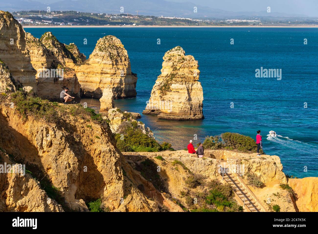Lagos, Portugal - 5 March 2020: Tourists visiting Ponta da Piedade Stock Photo