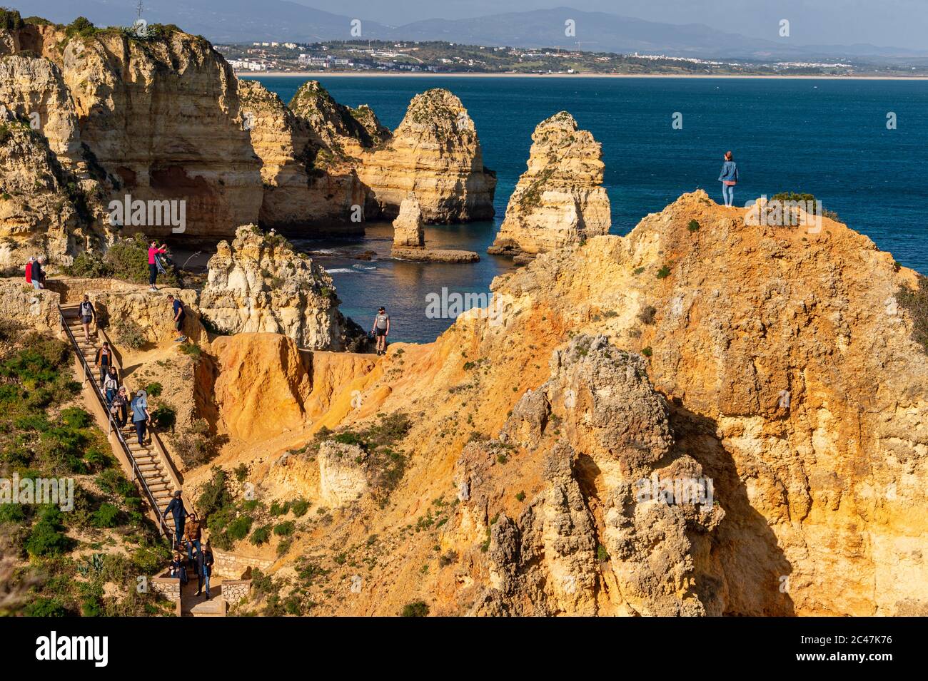 Lagos, Portugal - 5 March 2020: Tourists visiting Ponta da Piedade Stock Photo