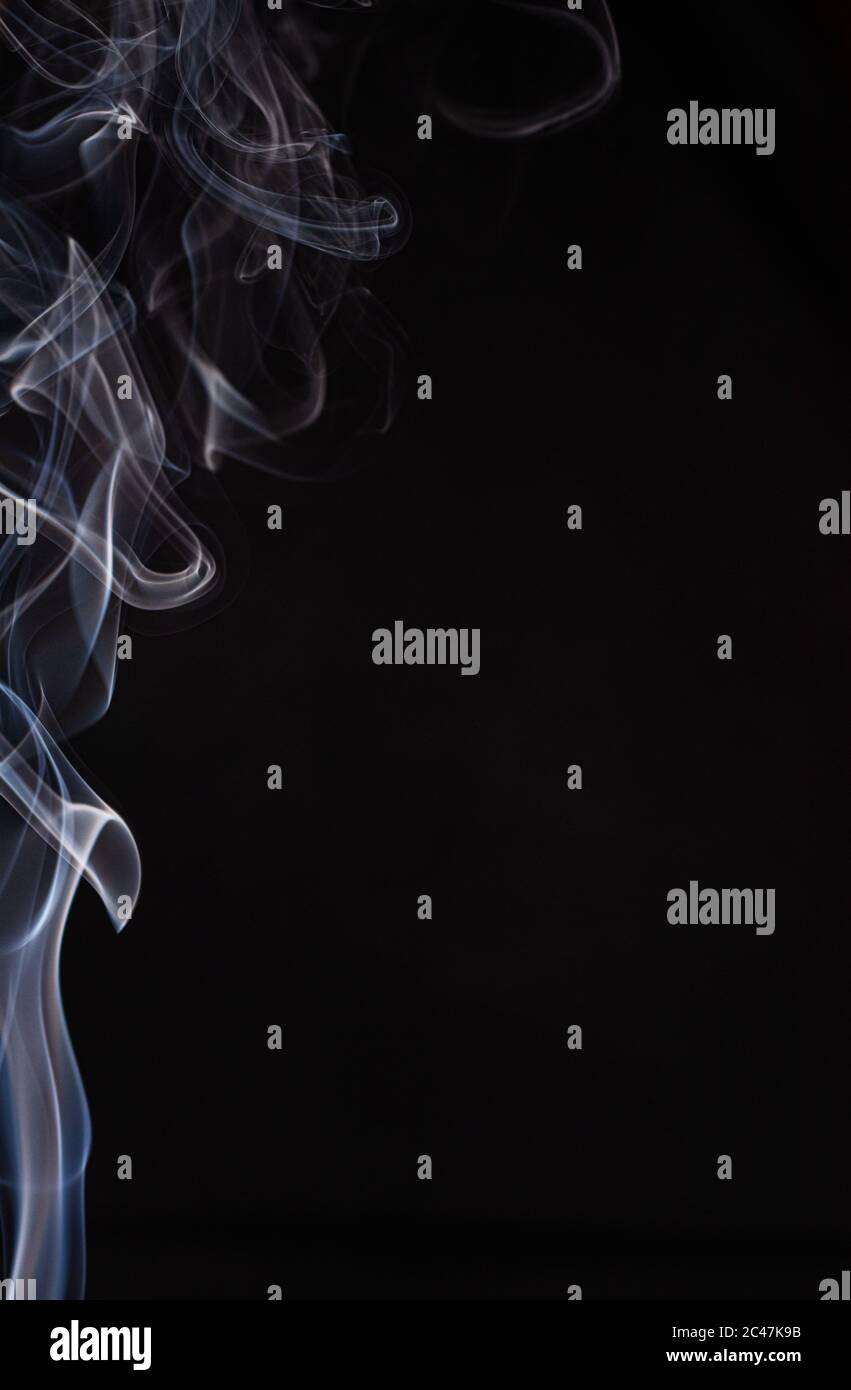Cloud of a white smoke isolated on a black background Stock Photo - Alamy