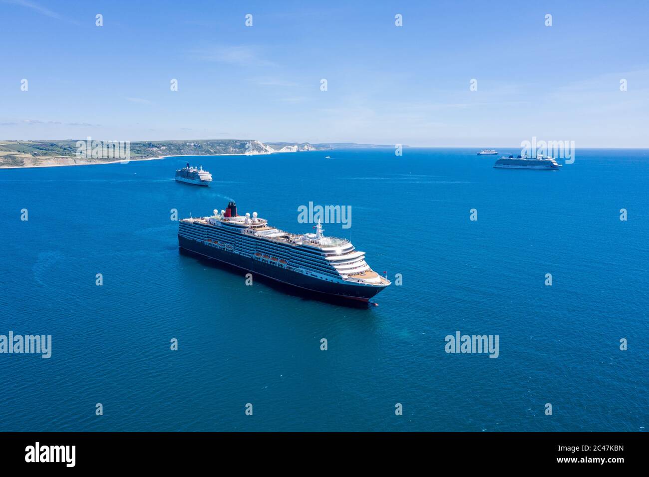 Cruise ships in Weymouth Bay Dorset pandemic Stock Photo