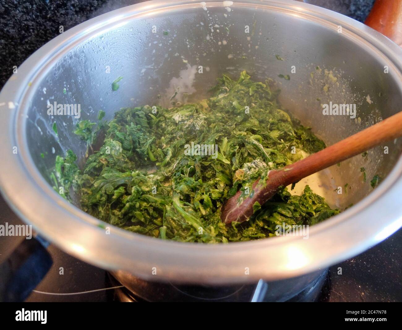 Spinach cooked in a span Stock Photo