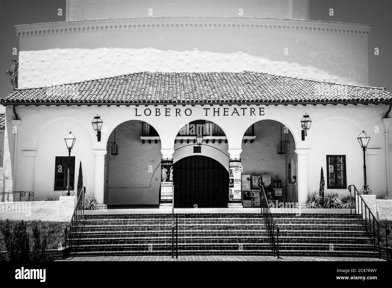Entrance to the Spanish Colonial revival style Lobero Theatre with Spanish tile roof, founded in 1873 in Santa Barbara, CA, in black and white Stock Photo