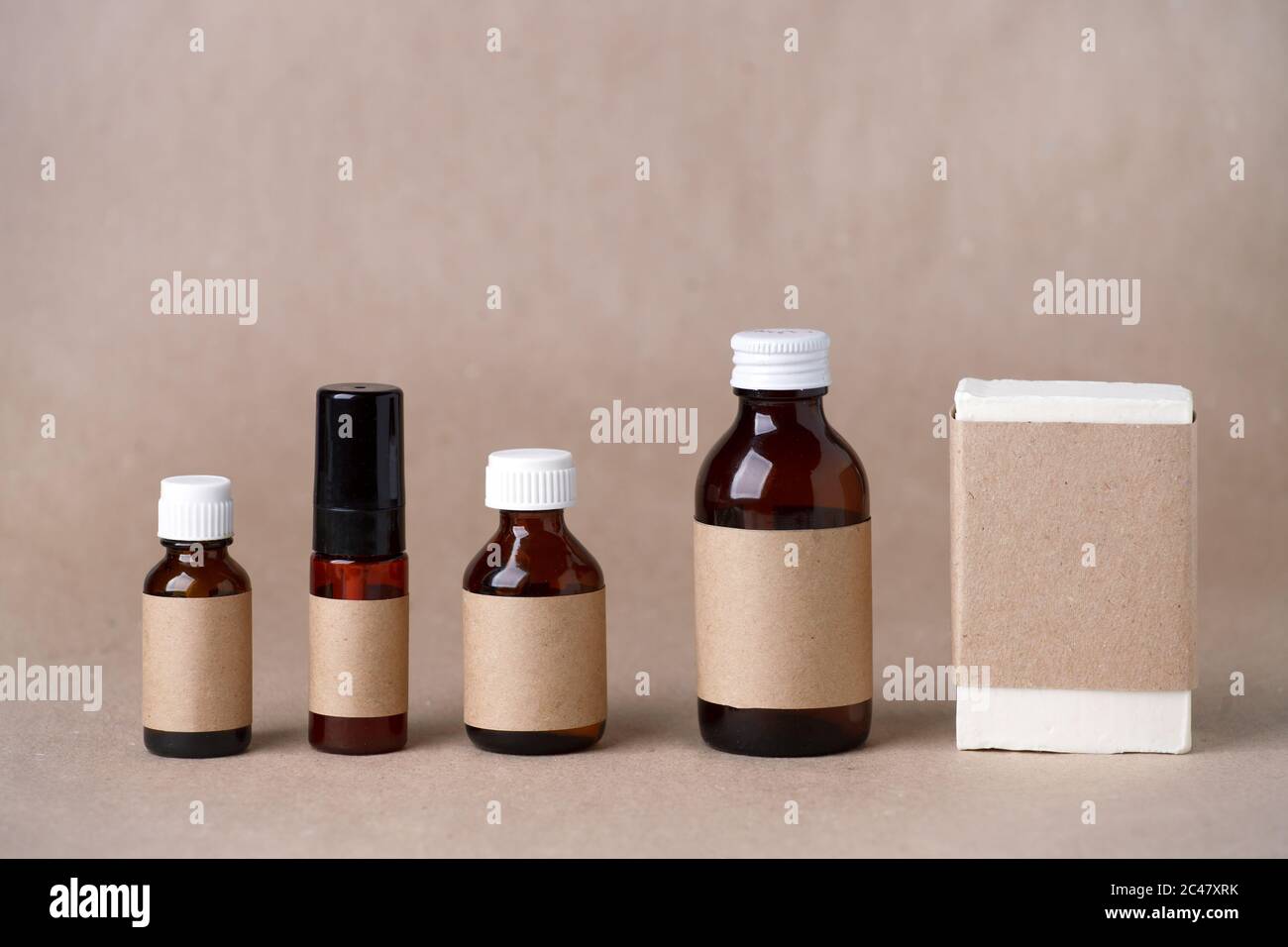 Download Set Of Cosmetic Dark Amber Glass Bottles With Paper Craft Label For Mock Up Closeup Copyspace Beauty Blogging Salon Treatment Concept Minimalism Stock Photo Alamy