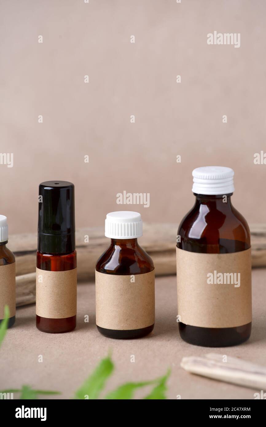 Download Set Of Cosmetic Dark Amber Glass Bottles With Paper Craft Label For Mock Up Closeup Copyspace Beauty Blogging Salon Treatment Concept Minimalism Stock Photo Alamy