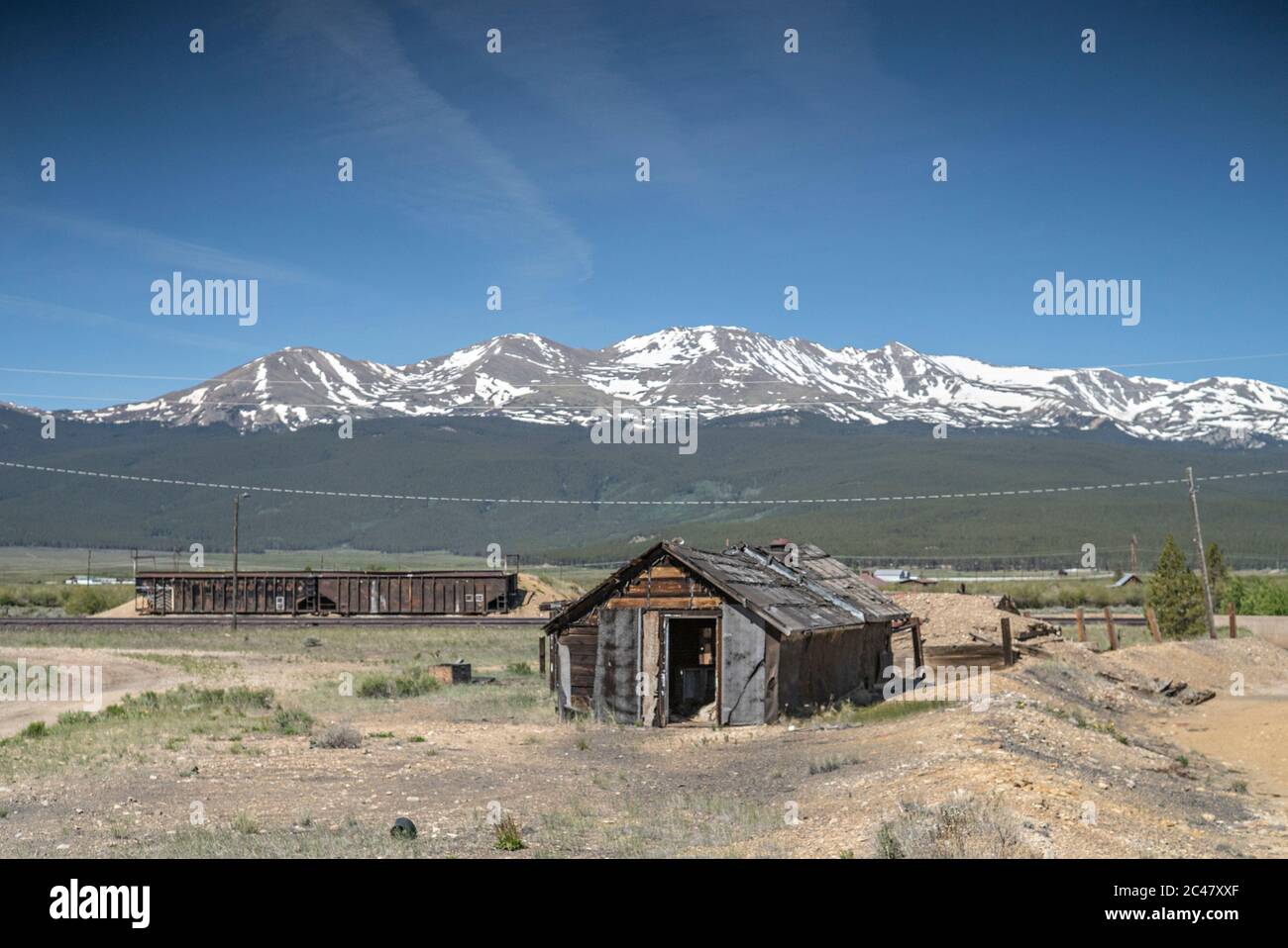 Abandoned wood structure and railroad freight cars in Leadville, Colorado, at the location of the former Oro City, Colorado, an abandoned ghost town Stock Photo