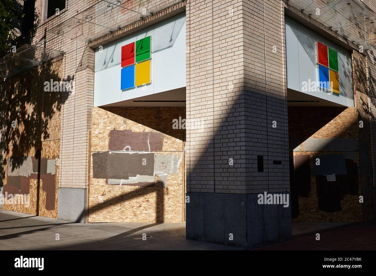 Closed and Boarded up Microsoft store in downtown Portland, Oregon, amid the ongoing BLM protest and coronavirus pandemic, seen on Tuesday, 6/23/2020. Stock Photo