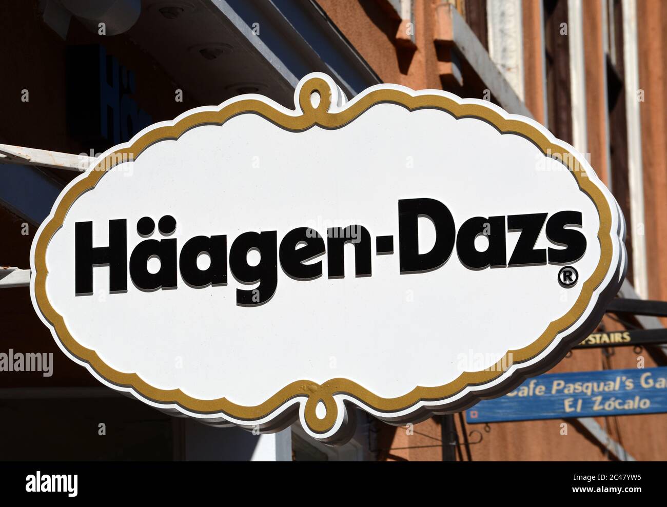 A business sign hangs over the entrance to a Haagen-Dazs ice cream shop in Santa Fe, New Mexico. Stock Photo