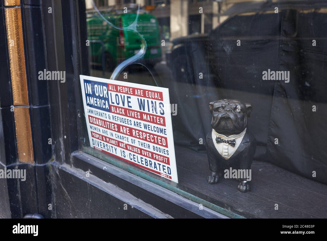 Pro-democracy and Black Lives Matter movement signage is seen in a closed retail store in downtown Portland, Oregon, on Tuesday, Jun 23, 2020. Stock Photo