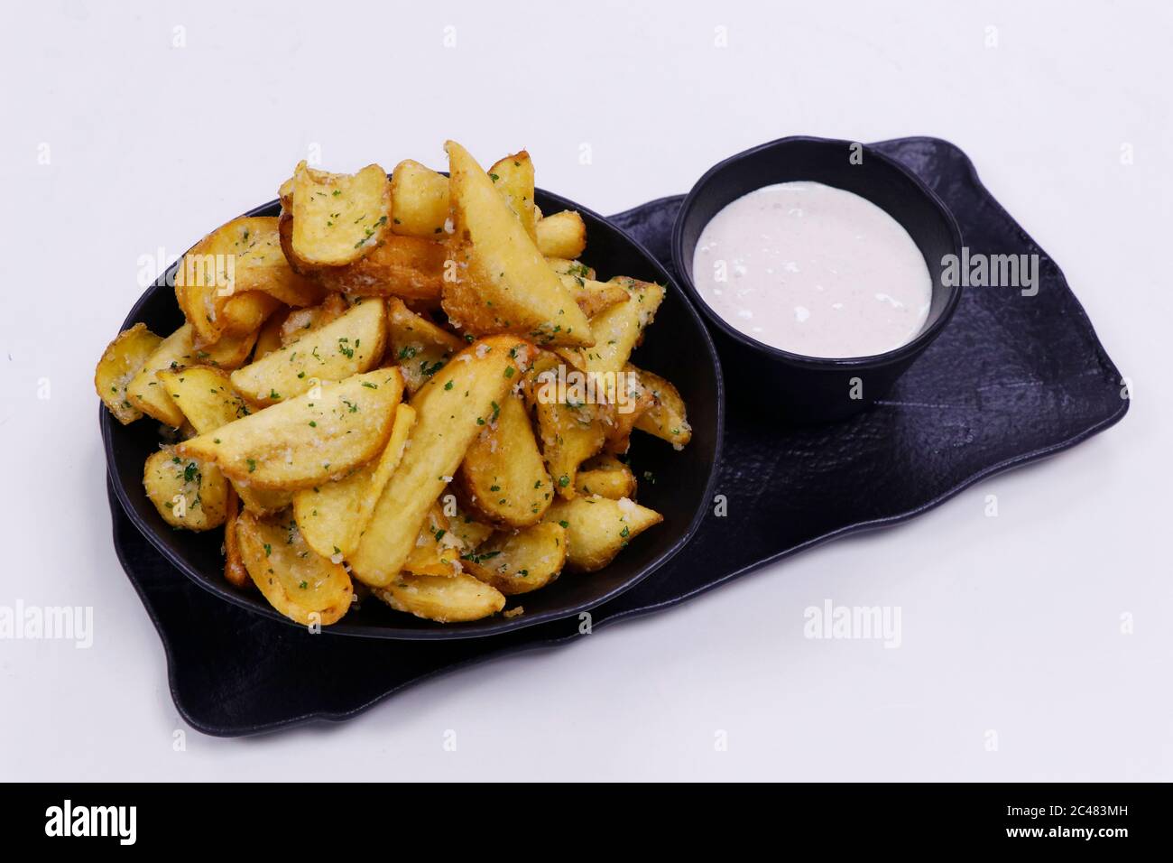 potato chips or wedges with truffle cream dip Stock Photo