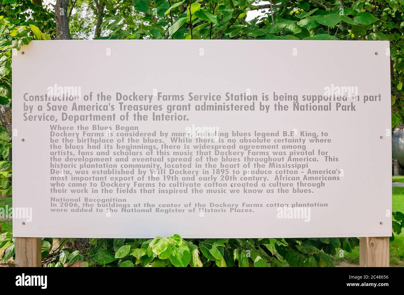 A sign at Dockery Service Station explains the restoration at Dockery Farms thanks to a Save America’s Treasures grant in Cleveland, Mississippi. Stock Photo