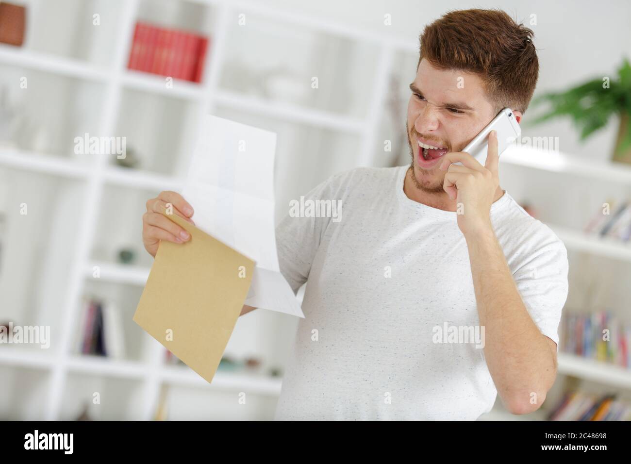 handsome hipster guy sharing positive emotions Stock Photo