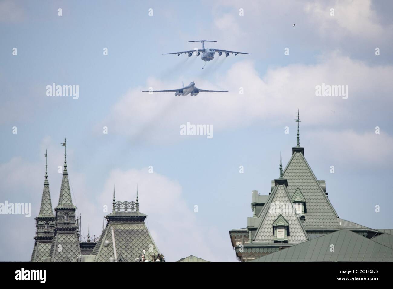 Moscow, Russia. 24th June, 2020. An Il-78 air tanker and a Tu-160 strategic bomber fly over the Red Square during the military parade marking the 75th anniversary of the victory in the Great Patriotic War in Moscow, Russia, on June 24, 2020. Credit: Alexander Zemlianichenko Jr/Xinhua/Alamy Live News Stock Photo