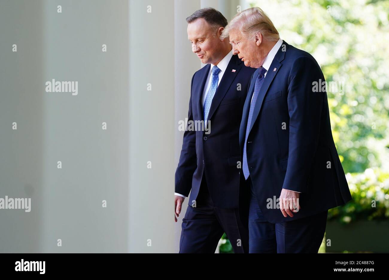 US President Donald J. Trump (R) and Polish President Andrzej Duda arrive to hold a joint press conference in the Rose Garden of the White House in Washington, DC, USA, 24 June 2020. Duda, a conservative nationalist facing a tight re-election race back home, is the first foreign leader to visit the White House in more than three months.Credit: Jim LoScalzo/Pool via CNP /MediaPunch Stock Photo