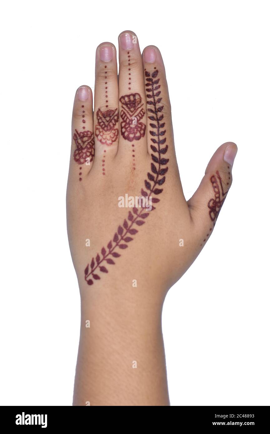 Woman Hands with black mehndi tattoo. Hands of Indian bride girl with black henna tattoos. Hand with perfect turquoise manicure and national Indian je Stock Photo - Alamy