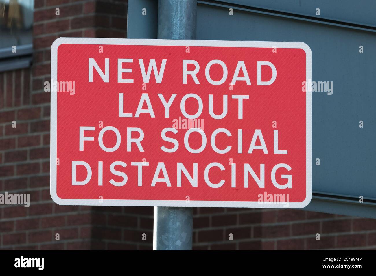 Eastleigh, UK. 24th June, 2020. Temporary new road layout sign enforcing social distancing as restrictions are lifted for the first time since the government mandated non-essential businesses to close due to the coronavirus pandemic. Credit: SOPA Images Limited/Alamy Live News Stock Photo