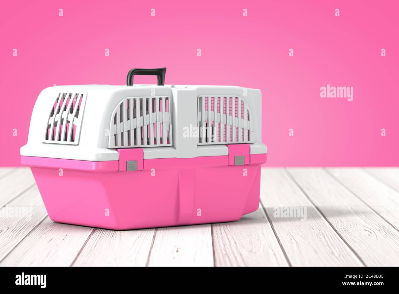 pink plastic dog crate