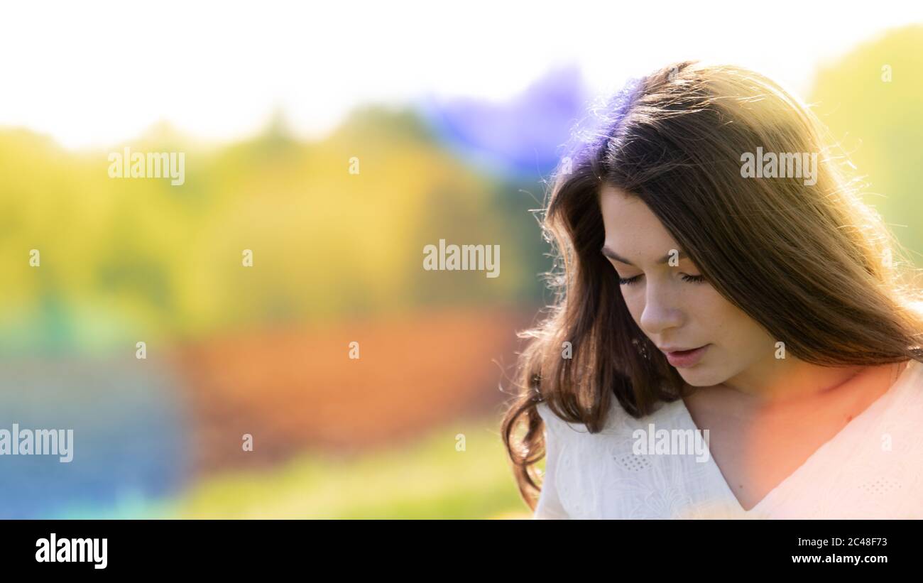 Outdoor portrait of Beautiful Young Attractive Woman Stock Photo - Alamy