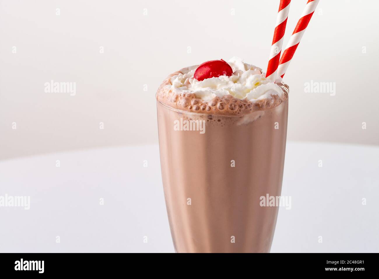 Chocolate milkshake with whipped cream Stock Photo Alamy