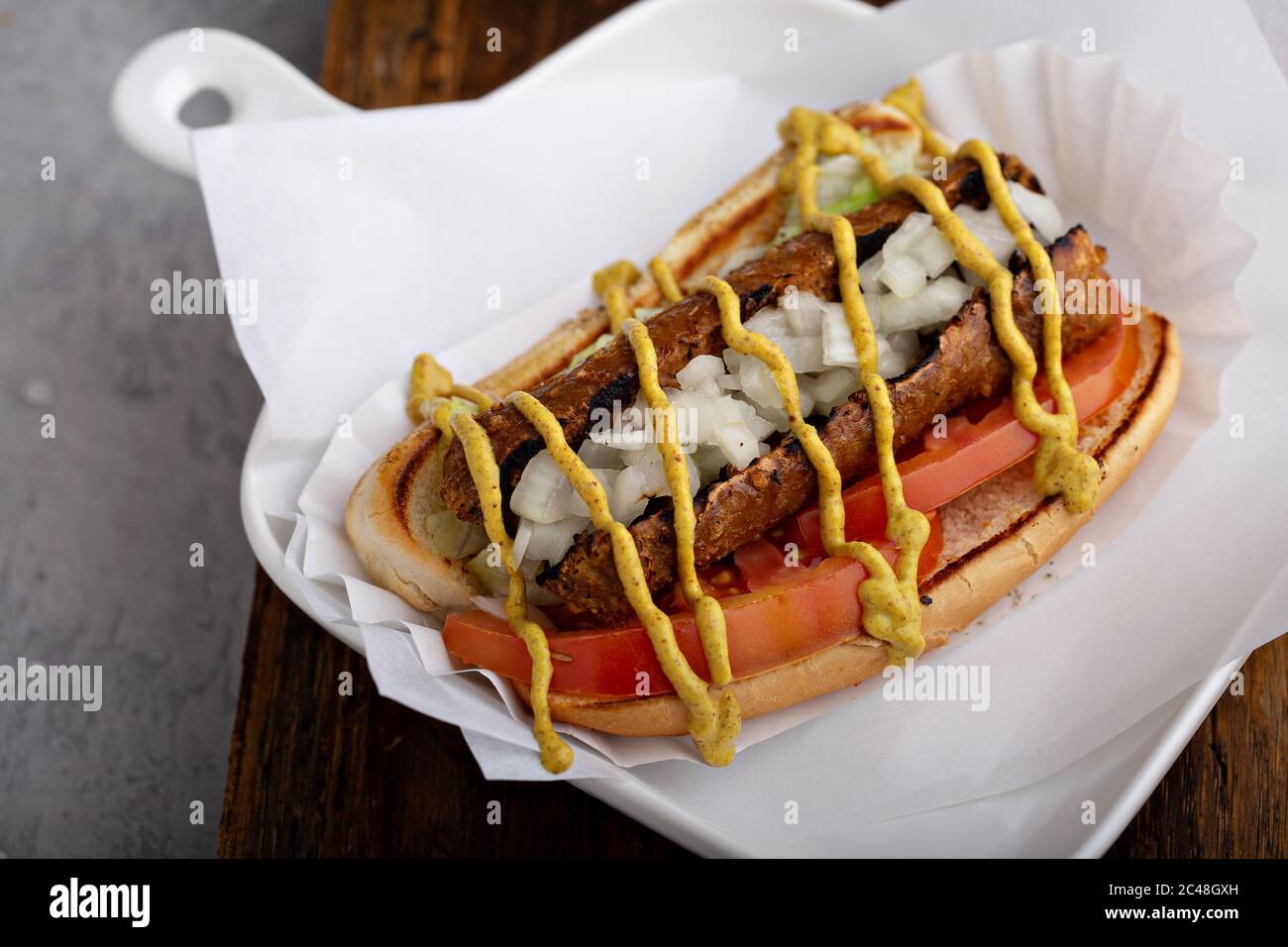 Vegan hot dog with meatless sausage Stock Photo