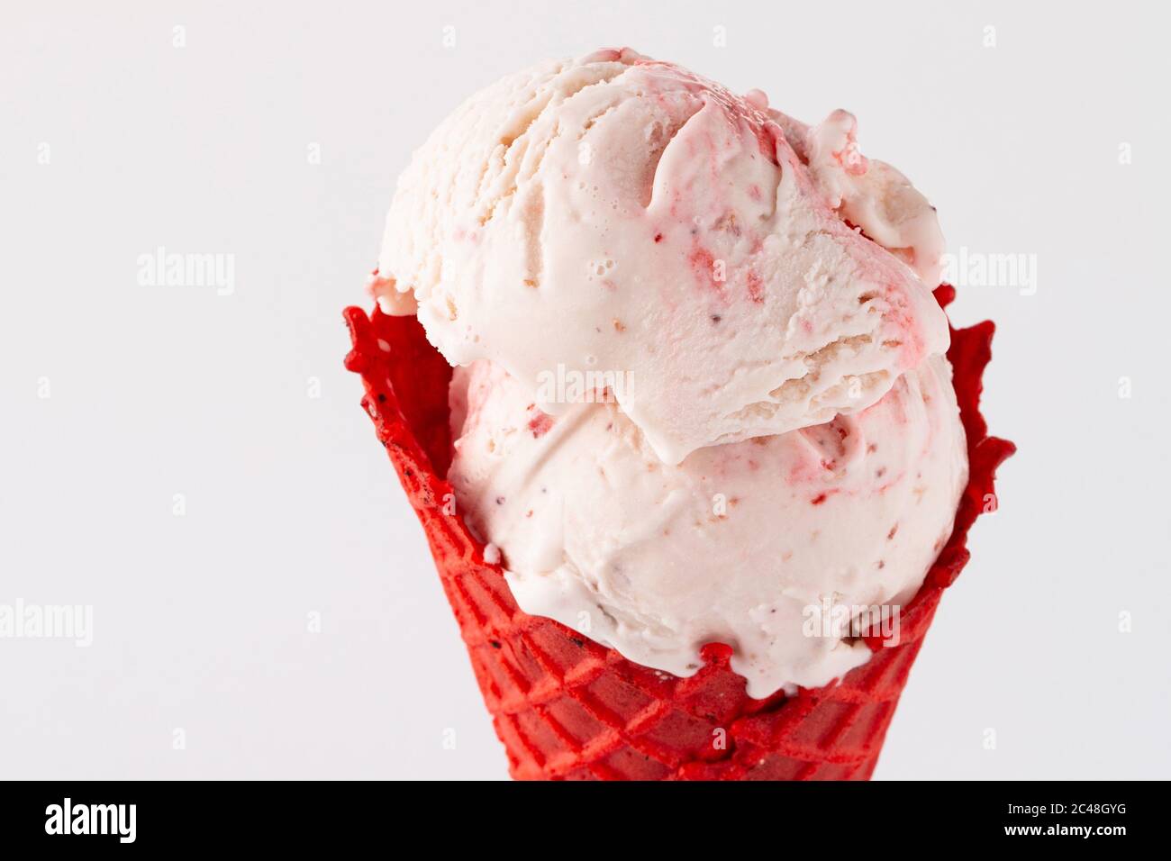 Strawberry ice cream in waffle cone Stock Photo - Alamy