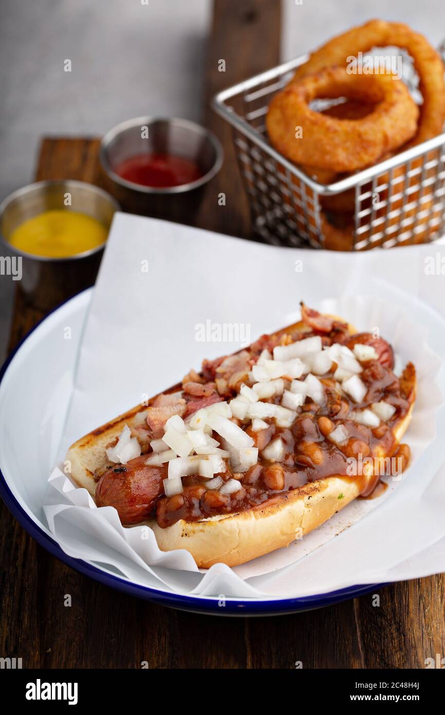 Chili hot dog with beans and onion Stock Photo Alamy