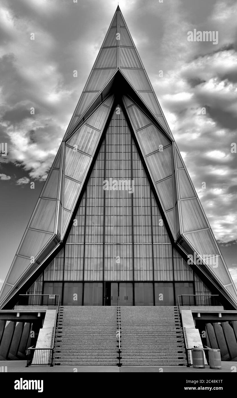 Vertical low angle grayscale shot of the famous Air Force Academy Cadet Chapel in the United States Stock Photo