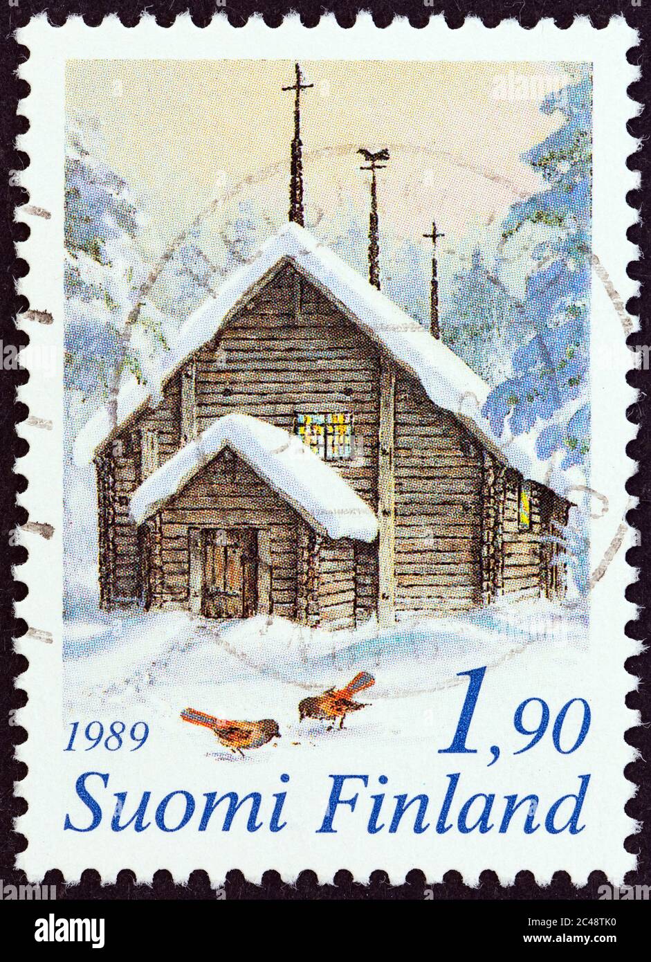 FINLAND - CIRCA 1989: A stamp printed in Finland from the 'Christmas' issue shows Sodankyla Church, Lapland, circa 1989. Stock Photo