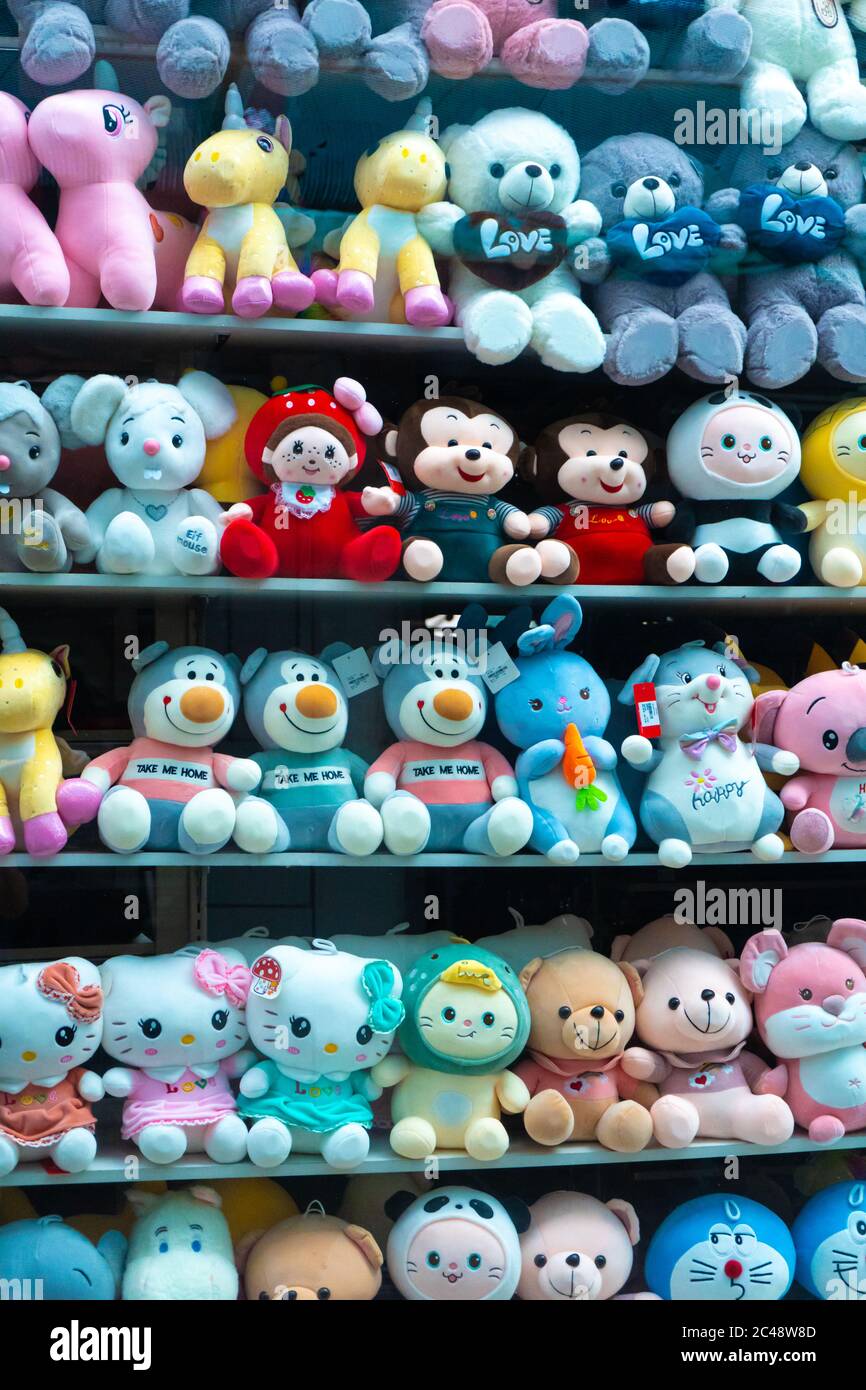 https://c8.alamy.com/comp/2C48W8D/the-shelves-of-the-toy-store-are-tightly-crammed-with-funny-soft-toys-in-the-form-of-different-animals-joy-to-the-child-2C48W8D.jpg