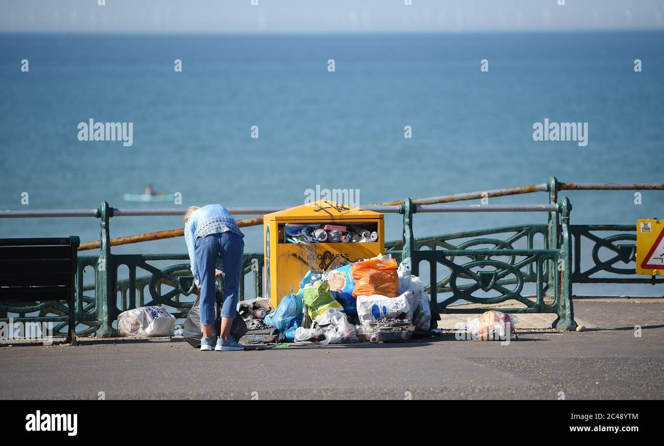 Picking up liiter hires stock photography and images Alamy