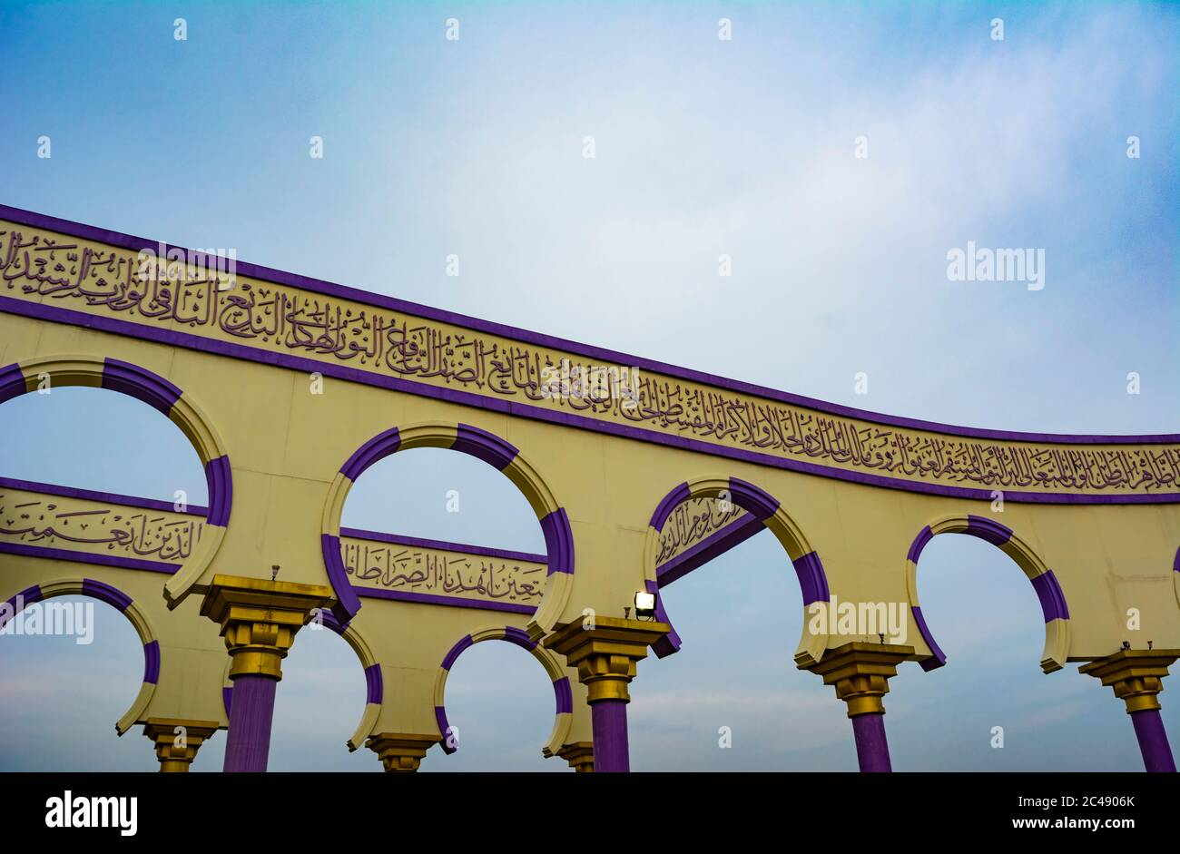 Semarang, Indonesia - CIRCA Nov 2019: The wall with arabic calligraphy and arch decoration in Masjid Agung Jawa Tengah (Great Mosque of Central Java) Stock Photo