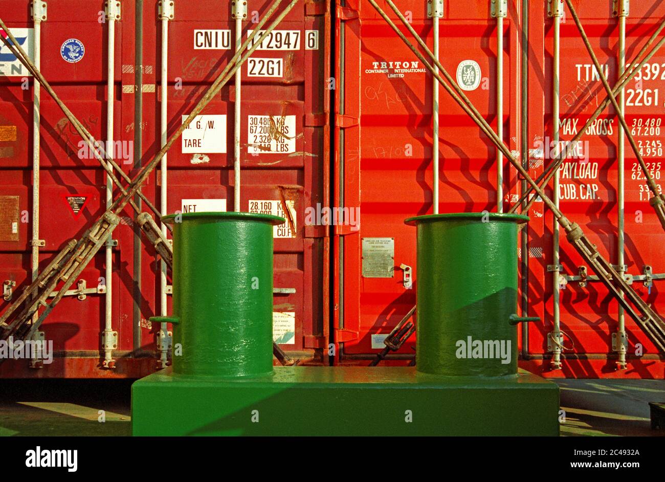 southamton, hampshire/united kingdom  - september 12, 2002: view onto containers stowed on deck and bollard of the container vessel  ccni chagres  (im Stock Photo