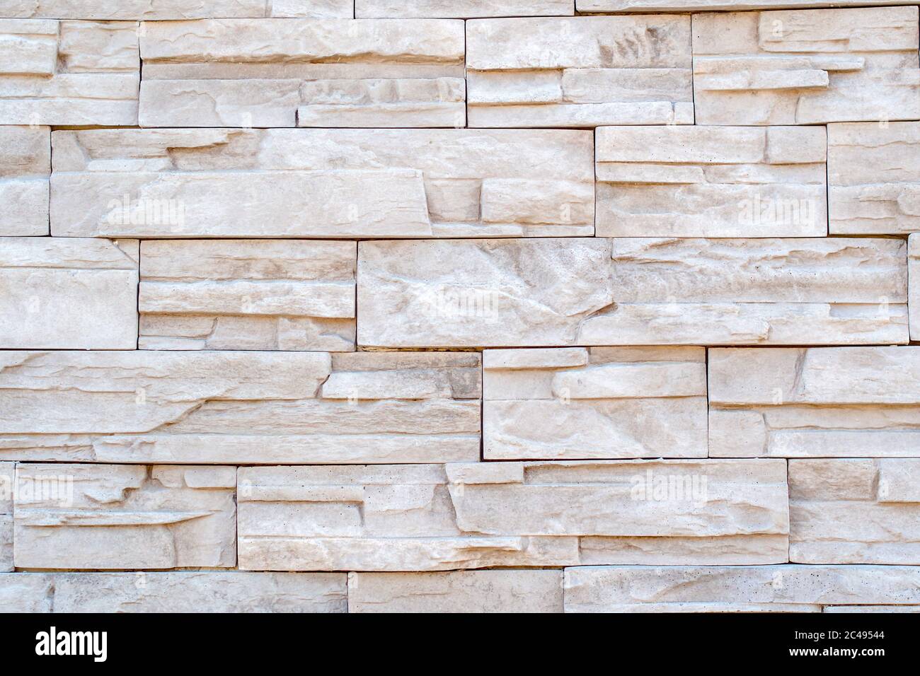 stone wall made of rocks with different size rectangles Stock Photo
