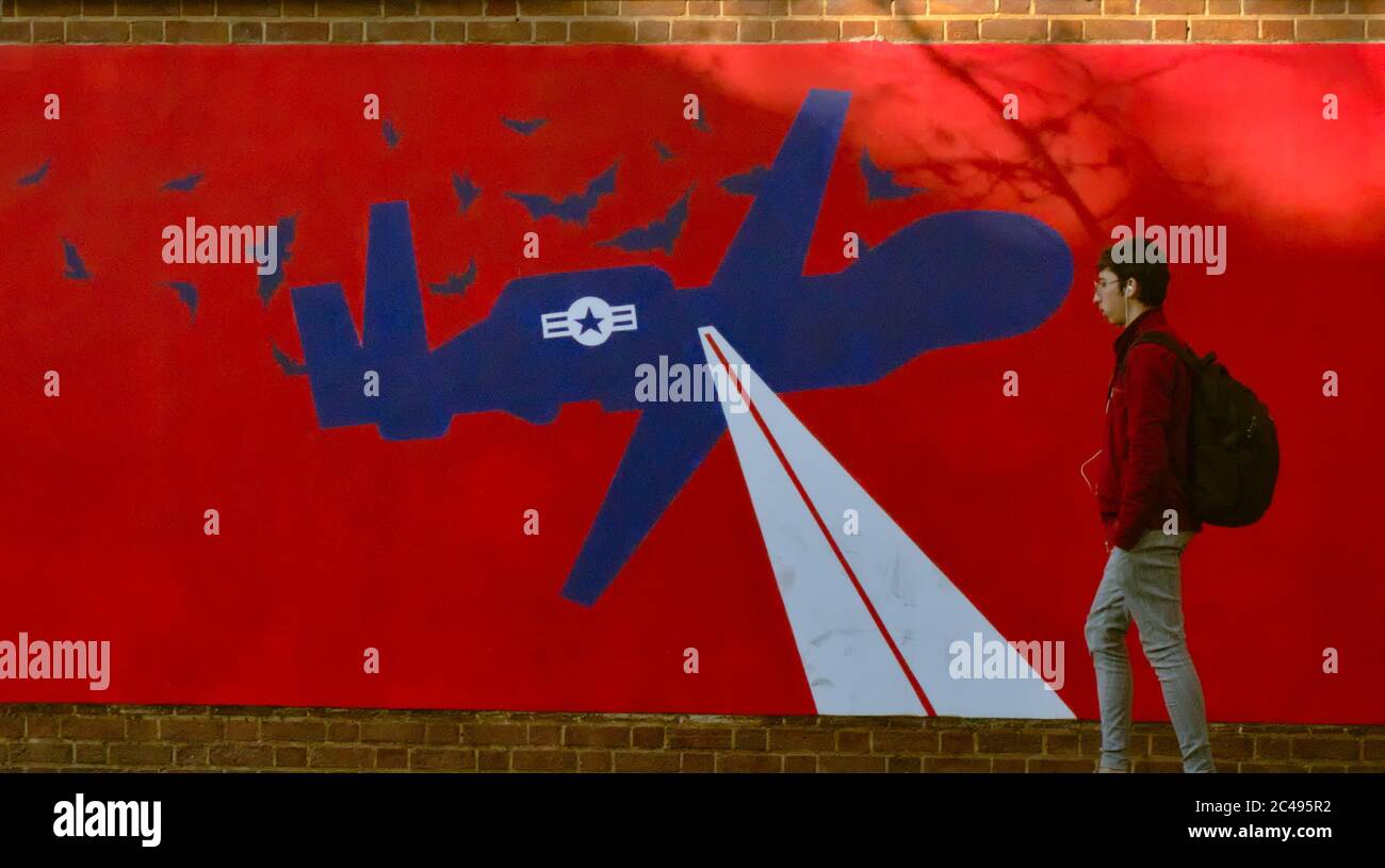 New anti-American mural outside former US embassy in Tehran showing US RQ-4A Global Hawk drone shot down by Iran in 2019 Stock Photo