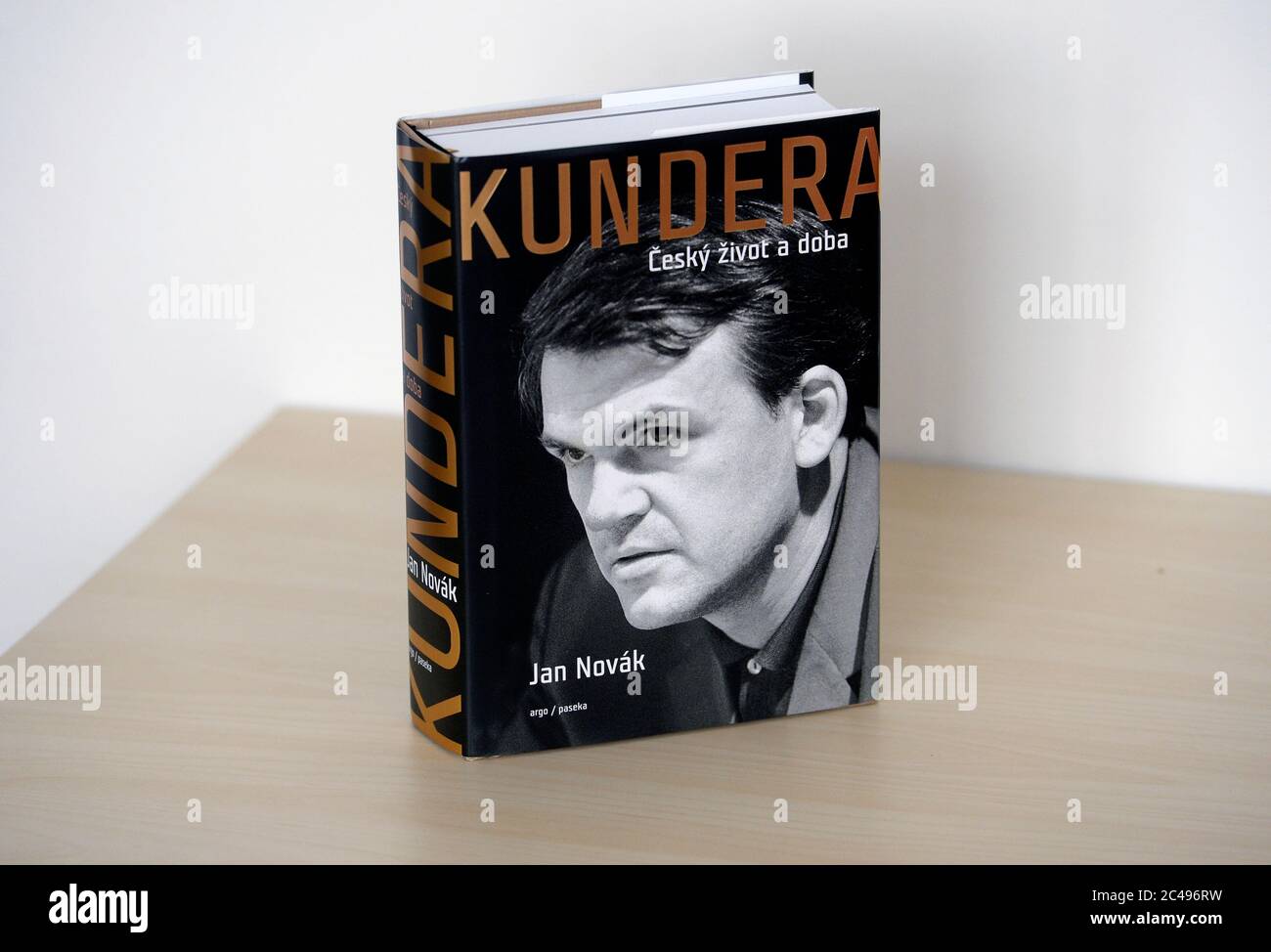 Prague, Czech Republic. 25th June, 2020. A new literary biography of Czech-born writer living in France Milan Kundera, 91, called Kundera: The Czech Life and Times, by Jan Novak, is seen on June 25, 2020, in Prague, Czech Republic. Novak worked on the biographical novel for four years. But he did not talk to Kundera since the writer, living in Paris for 45 years, did not react to Novak's requests for consultations. Credit: Katerina Sulova/CTK Photo/Alamy Live News Stock Photo