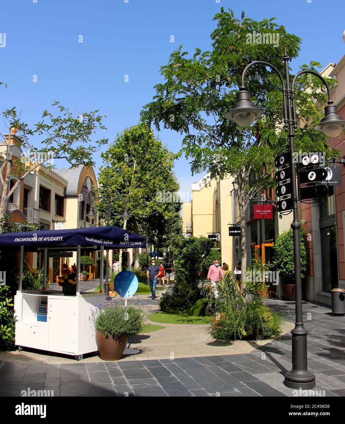 Las Rozas Village outlet shopping booth for help with nobody there Madrid Stock Photo - Alamy