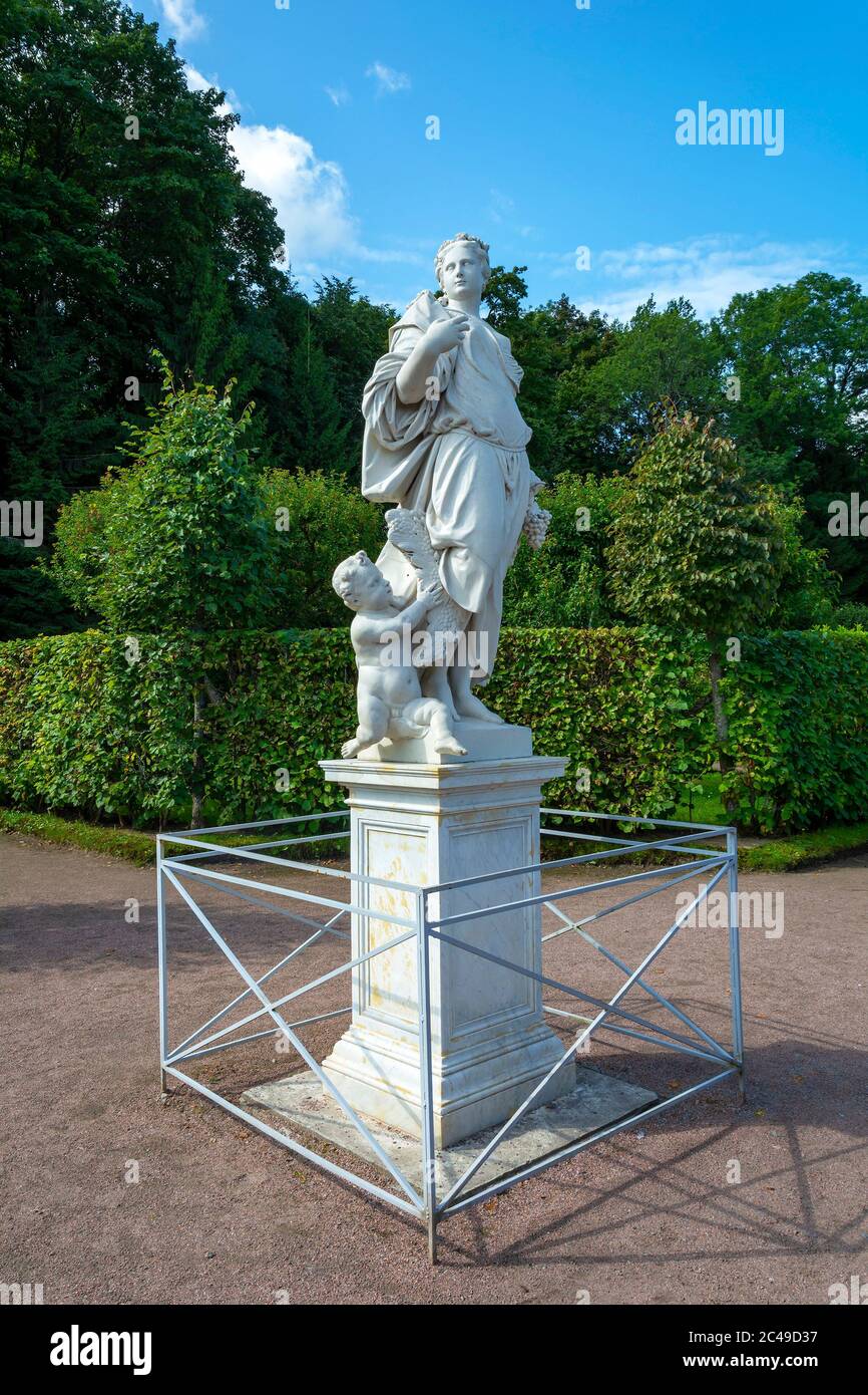 Peterhof, marble statue of Earth in the garden of Bacchus in the Lower Park Stock Photo