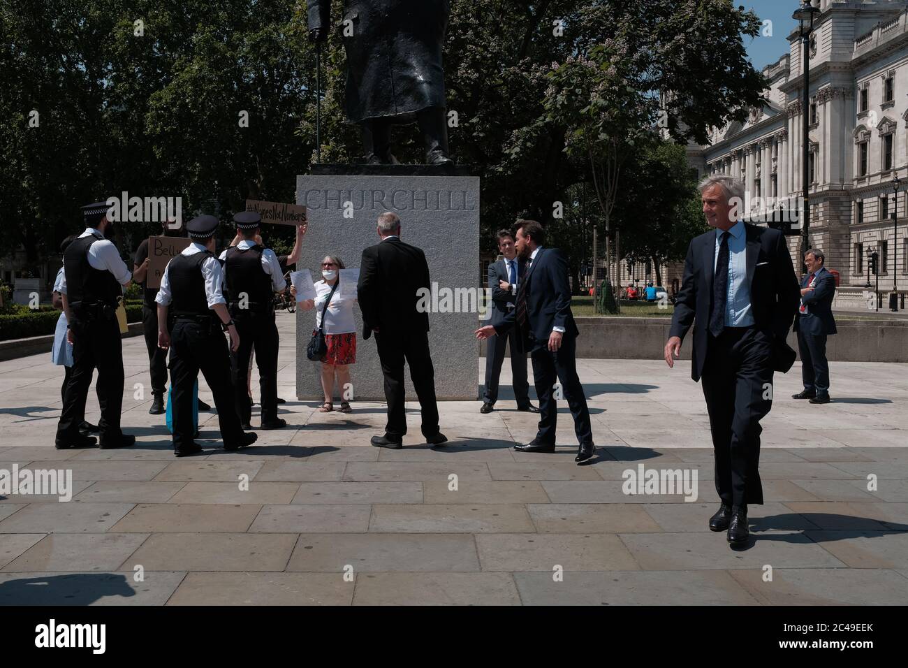 Small party of anti brexit protesters and Mp's outside Parliament after prime ministers Question's, 24/06/20 Stock Photo