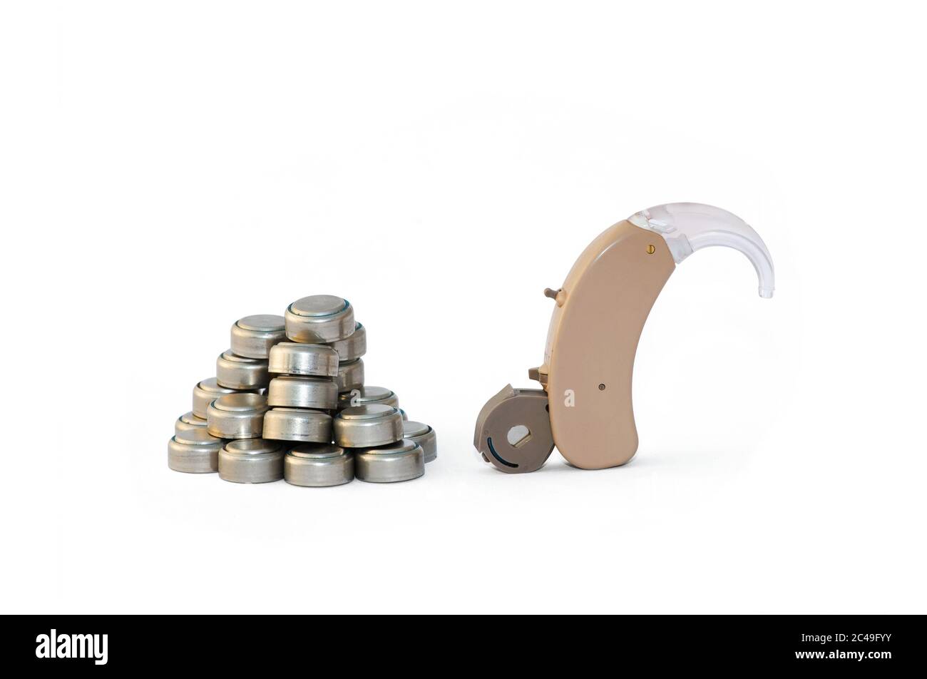 Digital hearing aid with open battery holder on white background with