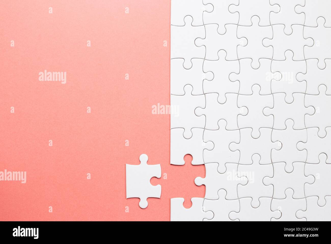 Set of white puzzle pieces and last one piece Stock Photo