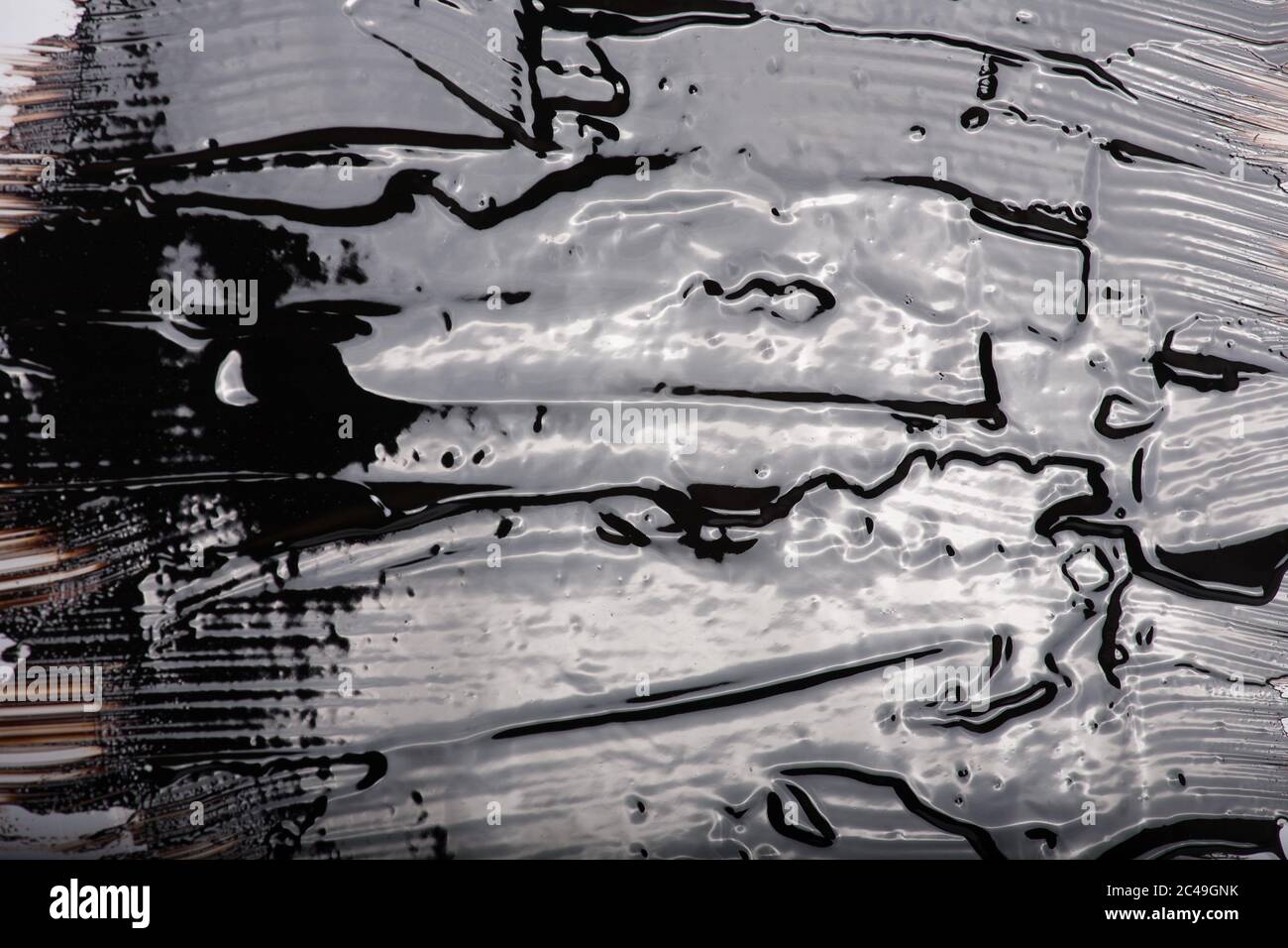 Liquid bitumen surface for backgrounds, textures Stock Photo