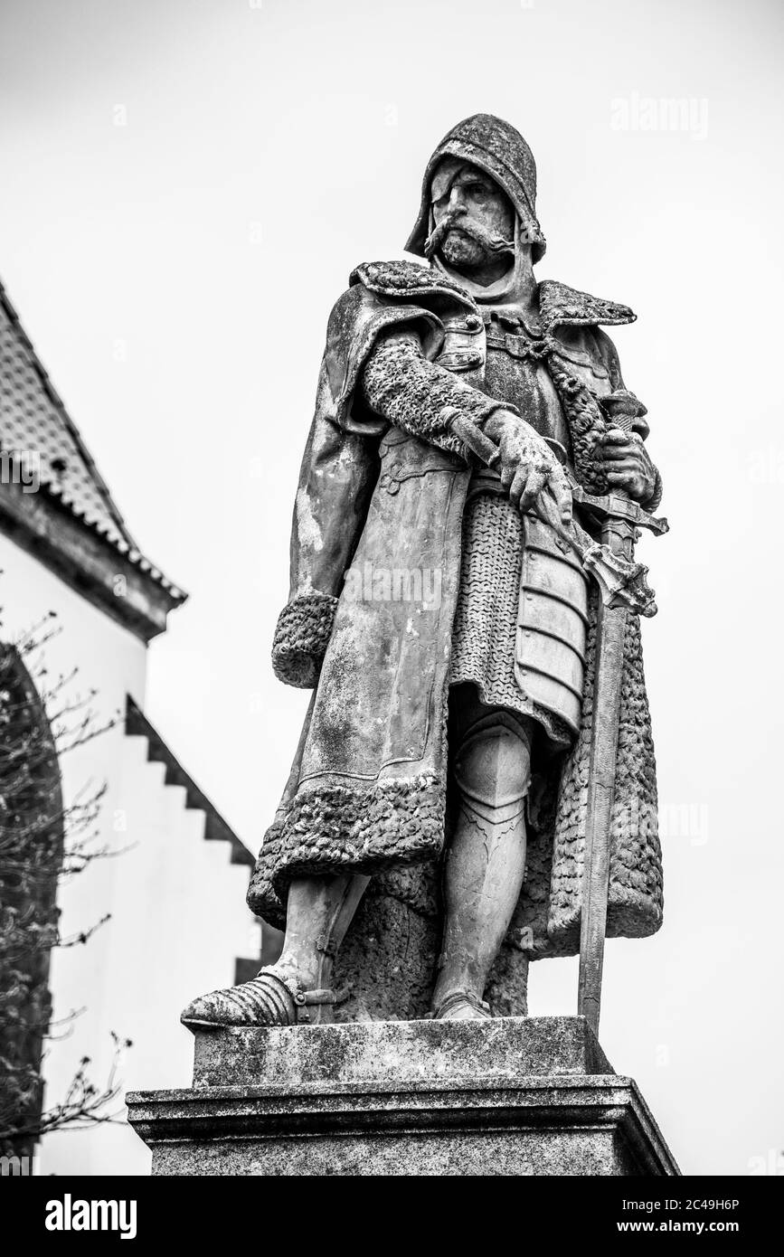 TABOR, CZECH REPUBLIC - APRIL 10, 2019: Jan Zizka of Trocnov and Chalice statue. Hussite military leader and Czech national hero. Tabor Main square, Czech Republic. Black and white image. Stock Photo